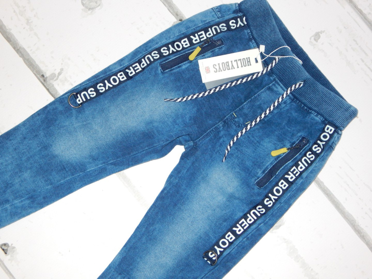 Spodnie dresowe dekatyzowane a'la jeans z taśmami Spodnie dresowe dekatyzowane a'la jeans z taśmami