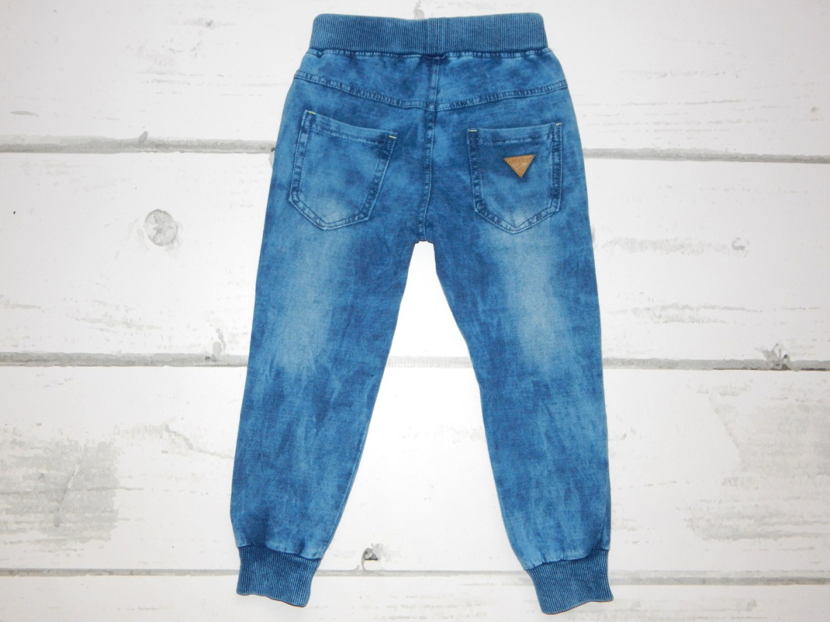 Spodnie dresowe dekatyzowane a'la jeans z taśmami Spodnie dresowe dekatyzowane a'la jeans z taśmami
