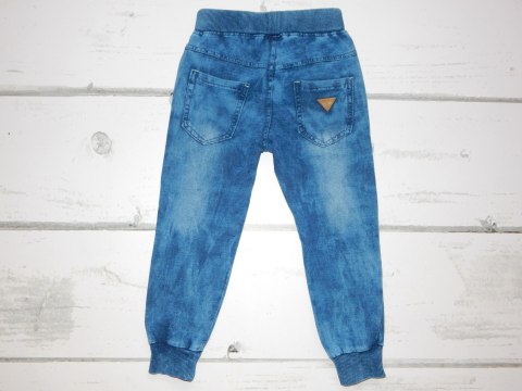 Spodnie dresowe dekatyzowane a'la jeans z taśmami Spodnie dresowe dekatyzowane a'la jeans z taśmami