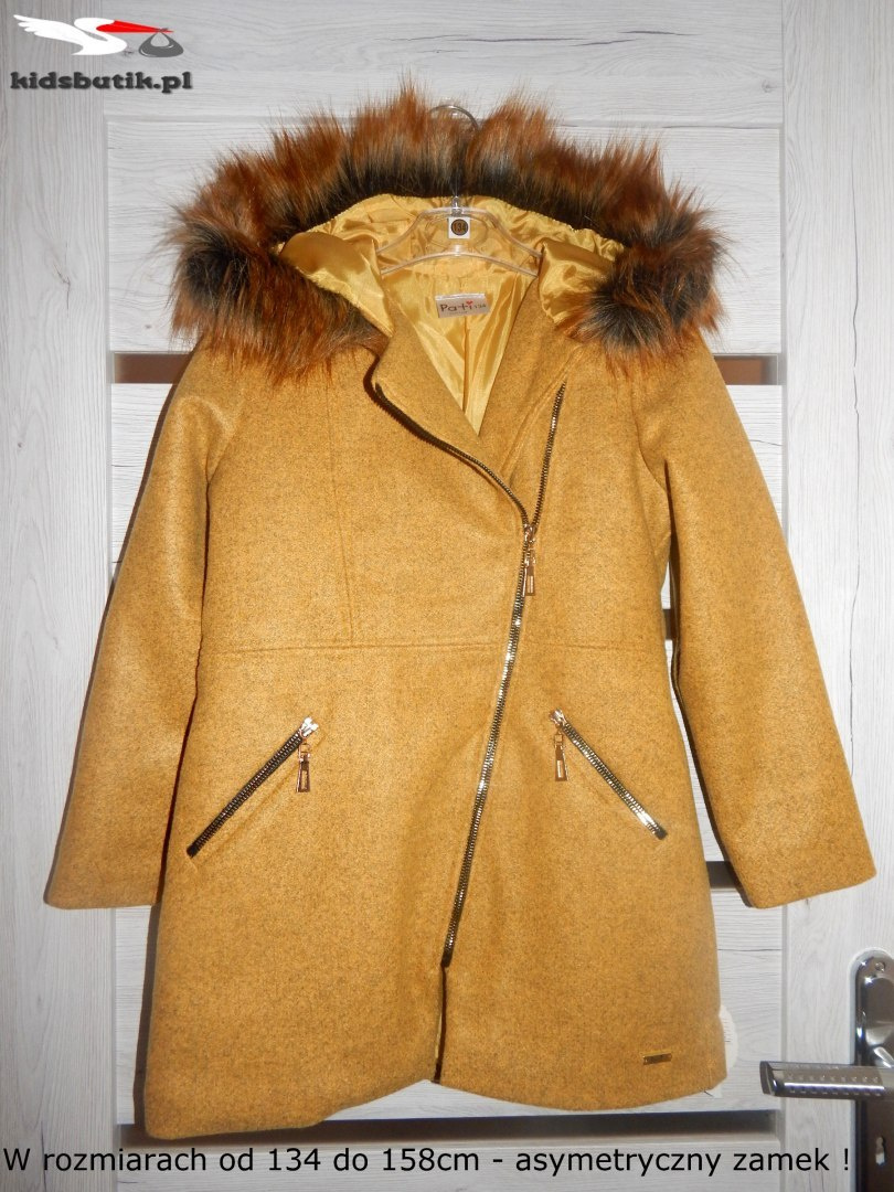 An elegant winter coat with fur An elegant winter coat with fur