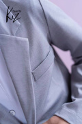 Sports an elegant suit IWO with shirt included. Sports an elegant suit IWO with shirt included.