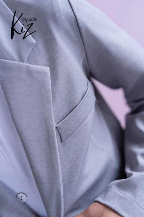 Sports an elegant suit IWO with shirt included. Sports an elegant suit IWO with shirt included.