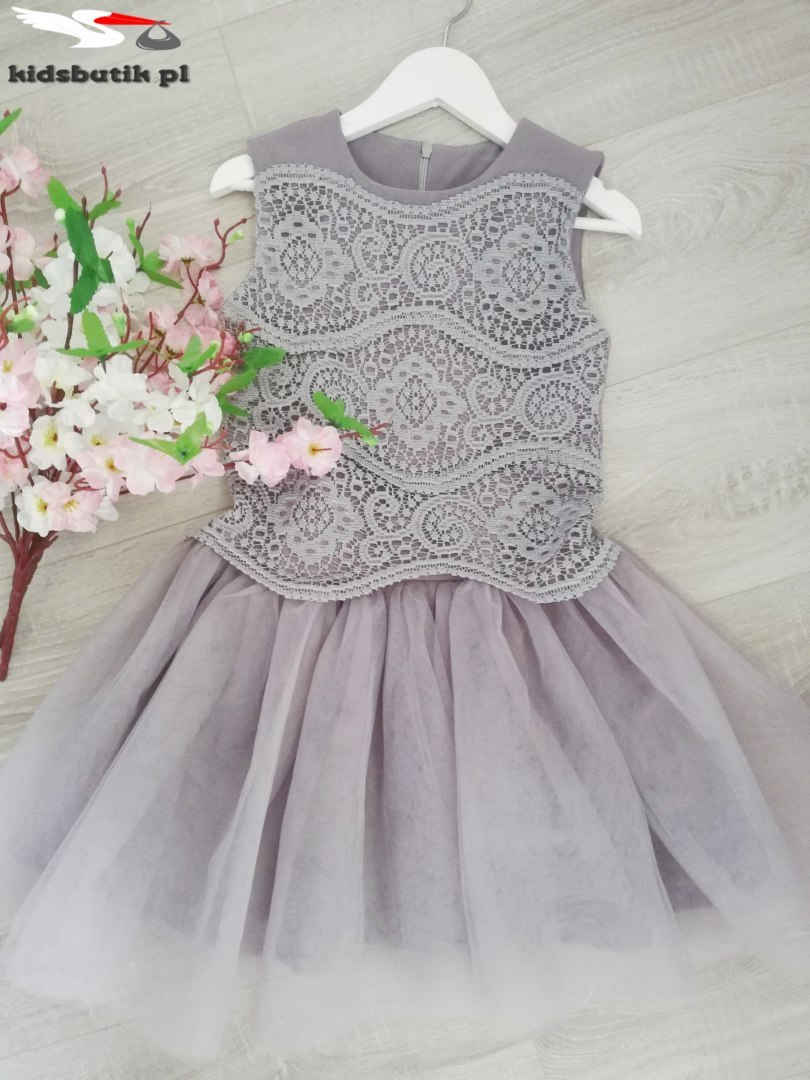 Elegant dress with a corset with a guipure Elegant dress with a corset with a guipure