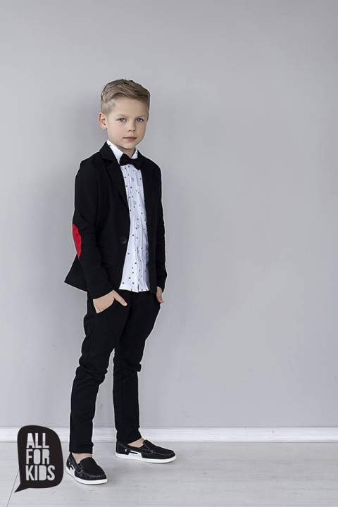Elegantly sporty black suit with bow tie and red patches Elegantly sporty black suit with bow tie and red patches