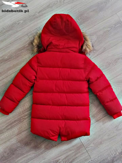 Winter quilted red jacket with fur trim and decorative ziplocks Winter quilted red jacket with fur trim and decorative ziplocks