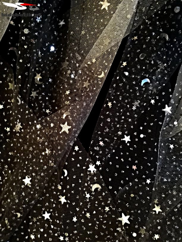 Cascading tulle skirt in glittery stars Cascading tulle skirt in glittery stars