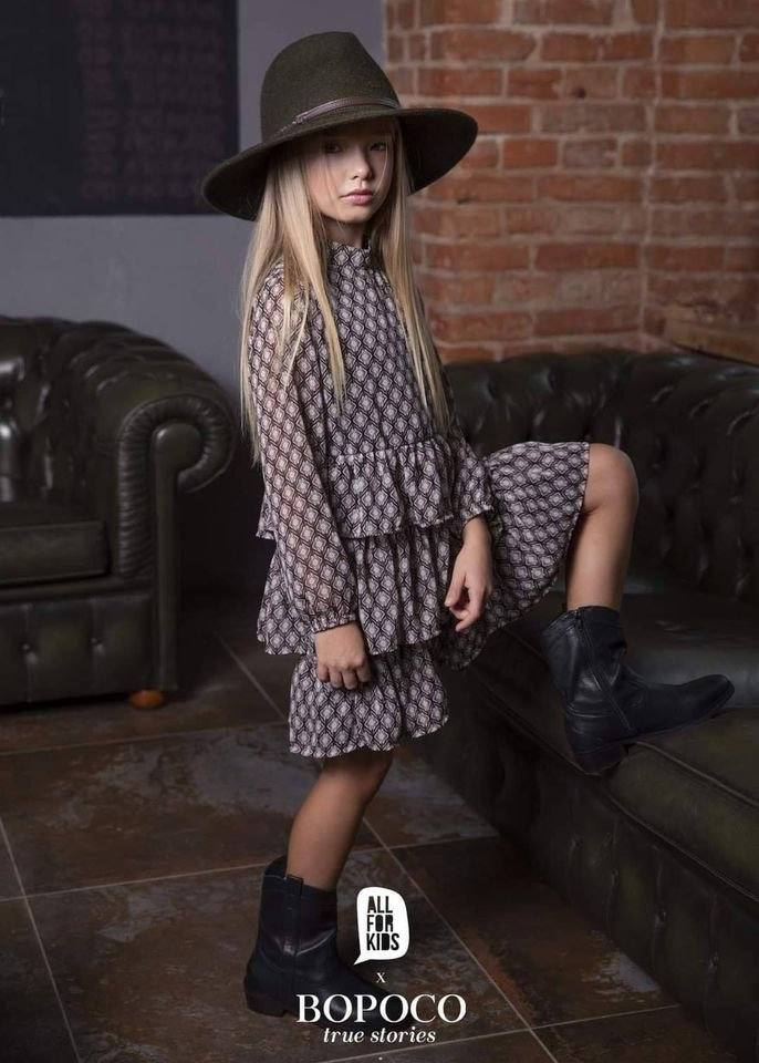 Dress with flounces in a multicolored pattern for a daughter Dress with flounces in a multicolored pattern for a daughter