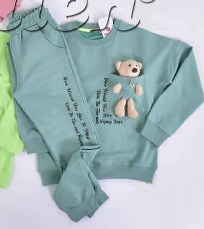 Tracksuit with teddy bear in the pocket and inscriptions - mint Tracksuit with teddy bear in the pocket and inscriptions - mint