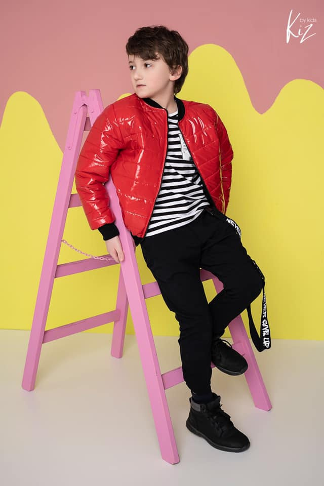 Quilted red jacket with a badge Quilted red jacket with a badge