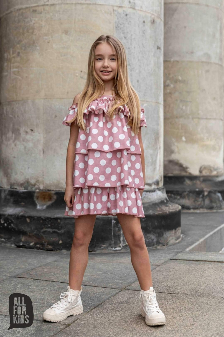Pink dress in peas with flounces Pink dress in peas with flounces