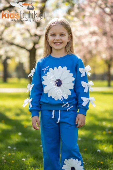 Dres premium z kwiatowym nadrukiem, broszką i kokardkami - chaber