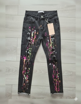 Spodnie jeans rurki z przetarciami nakrapiane - czarny