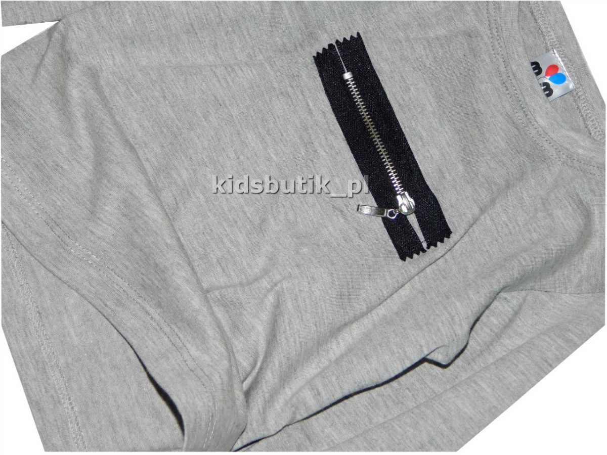 Stylowy tshirt z metalowym zamkiem Stylowy tshirt z metalowym zamkiem