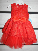 Czerwona koronkowa sukienka: brokat, kokarda i tiul