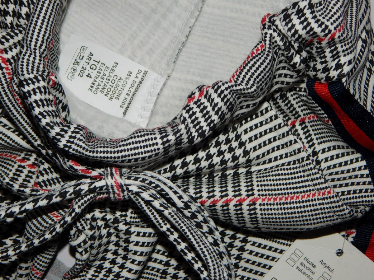 Elegancko sportowe spodnie w pepitkę z lampasami Elegancko sportowe spodnie w pepitkę z lampasami